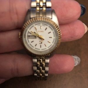 Gold and silver clasp watch